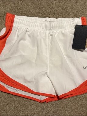 Nike Women's White Shorts with Orange Trim Athletic Running Shorts